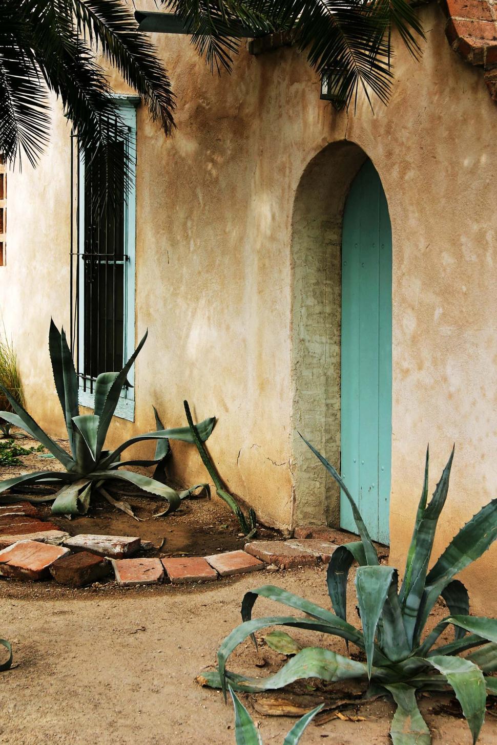 Free Image of Outside adobe house 