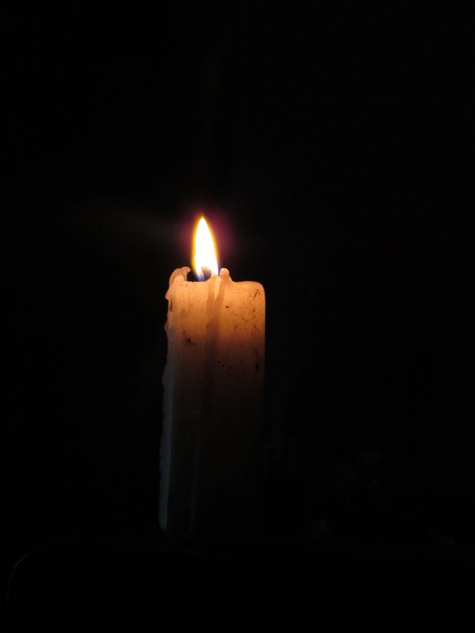 Free Image of Candle light on black background  