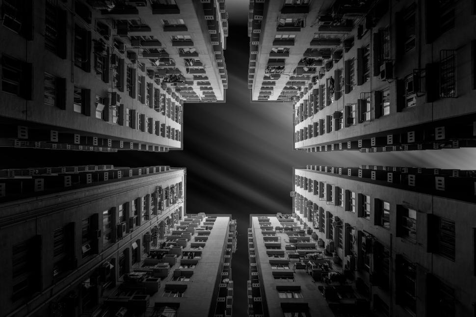 Free Image of Residential Towers and Sky From Below 