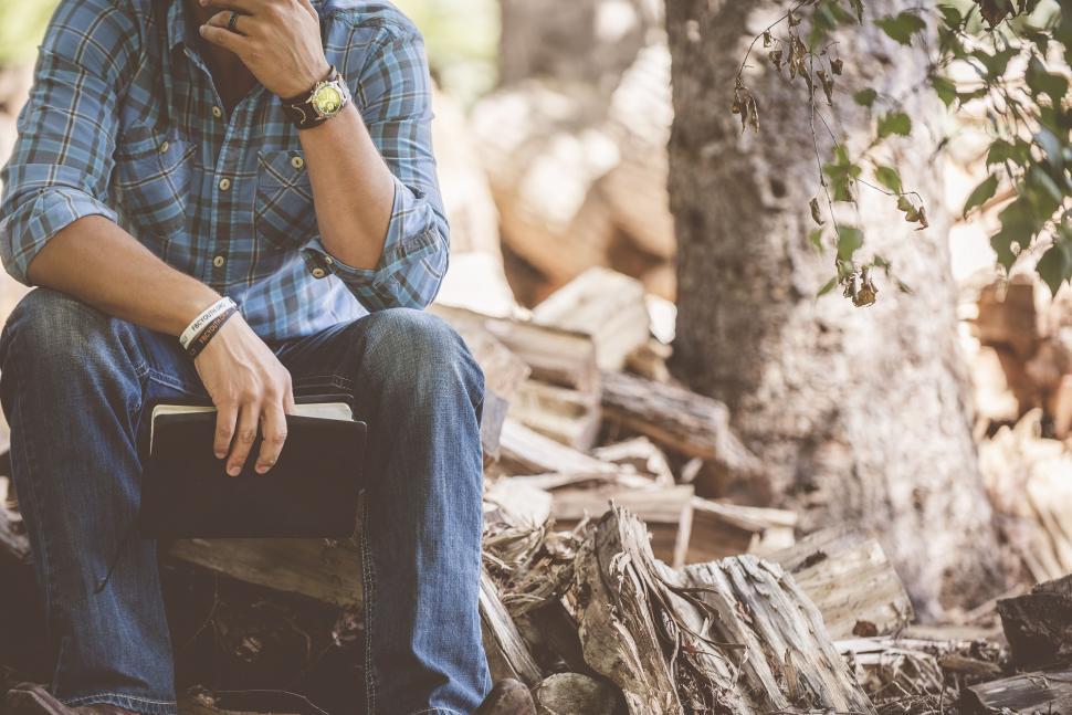 Free Image of Single Man with Notebook  