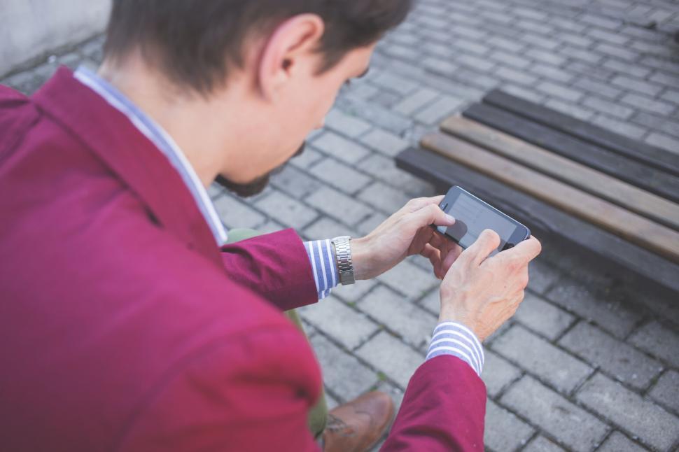 Free Image of Young Man with mobile phone 