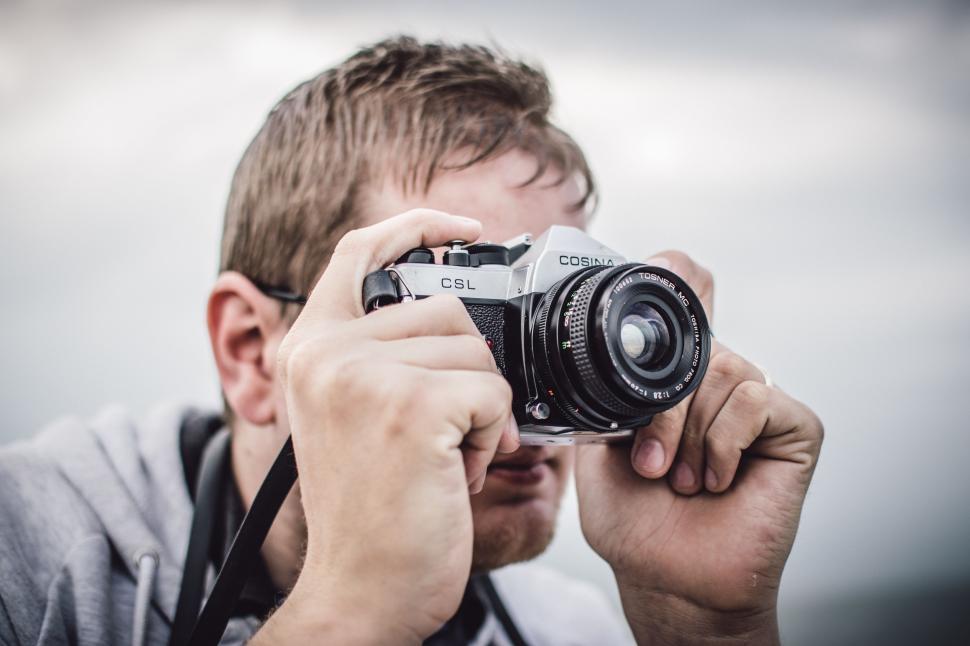 Free Image of Photographer with Cosina camera 