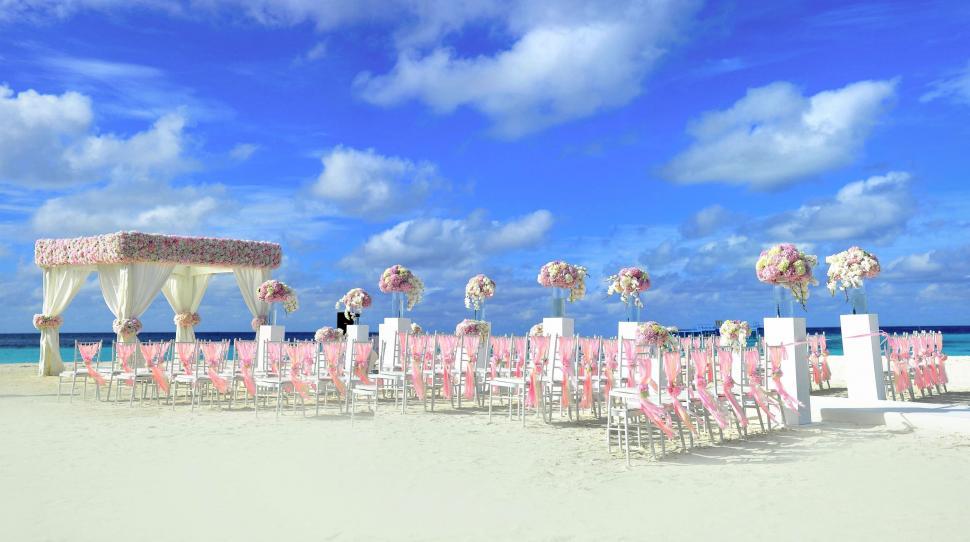 Free Image of Beach Wedding Set up with blue sky  
