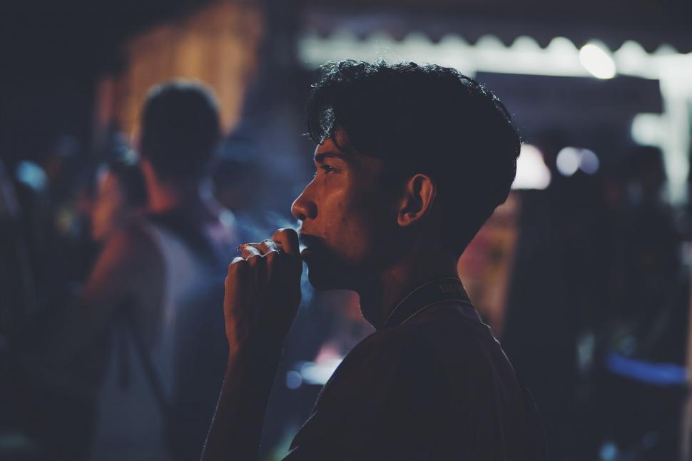 Free Image of Side view of smoking man 