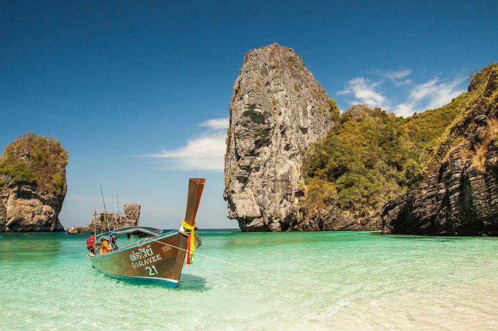 Free Image of Boat, Ocean and Rocks  