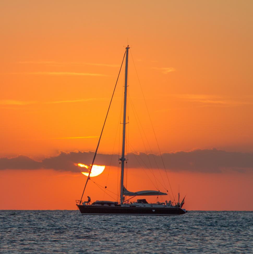 Free Image of Sailboat and Sunset  