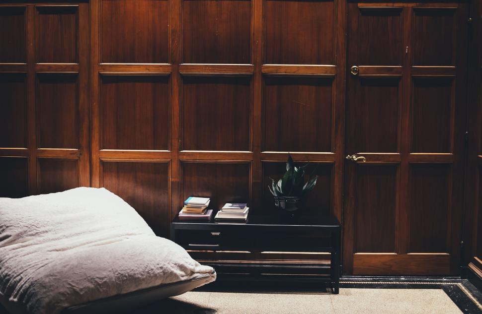 Free Image of Pillow and Wooden Wall  