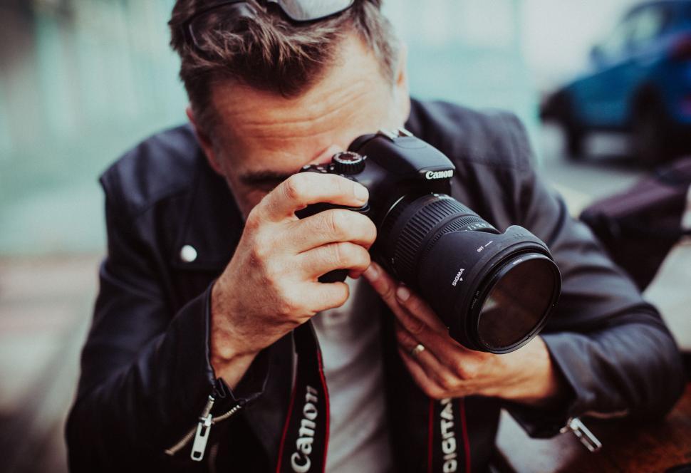 Free Image of Taking pictures using Canon Camera  