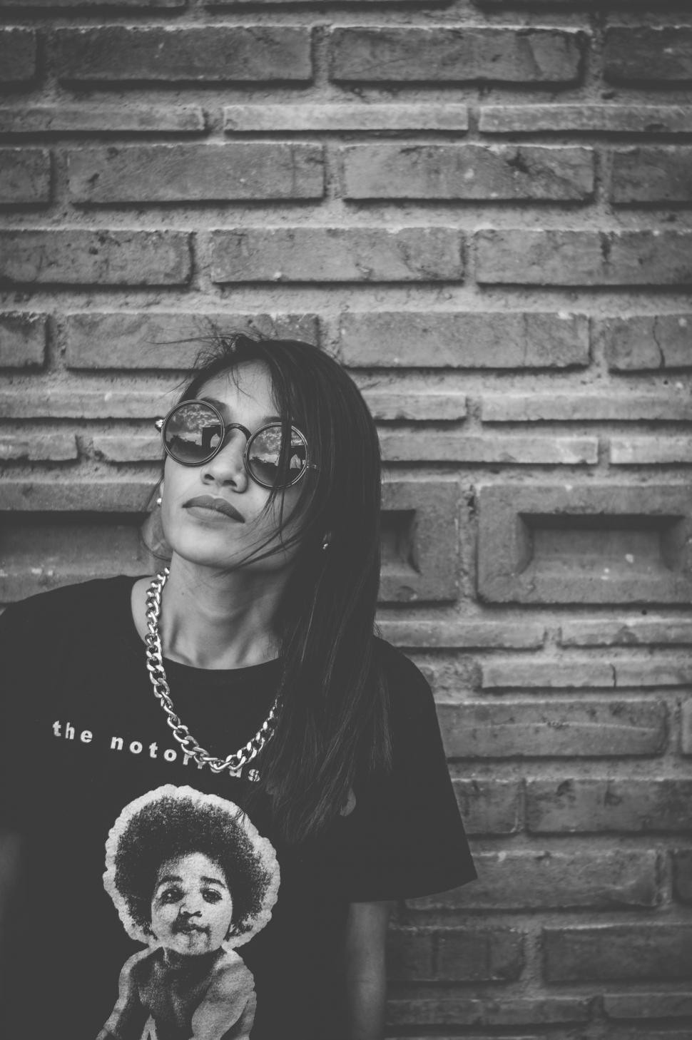 Free Image of Woman in Black Oval-Shape Sunglasses - B&W 