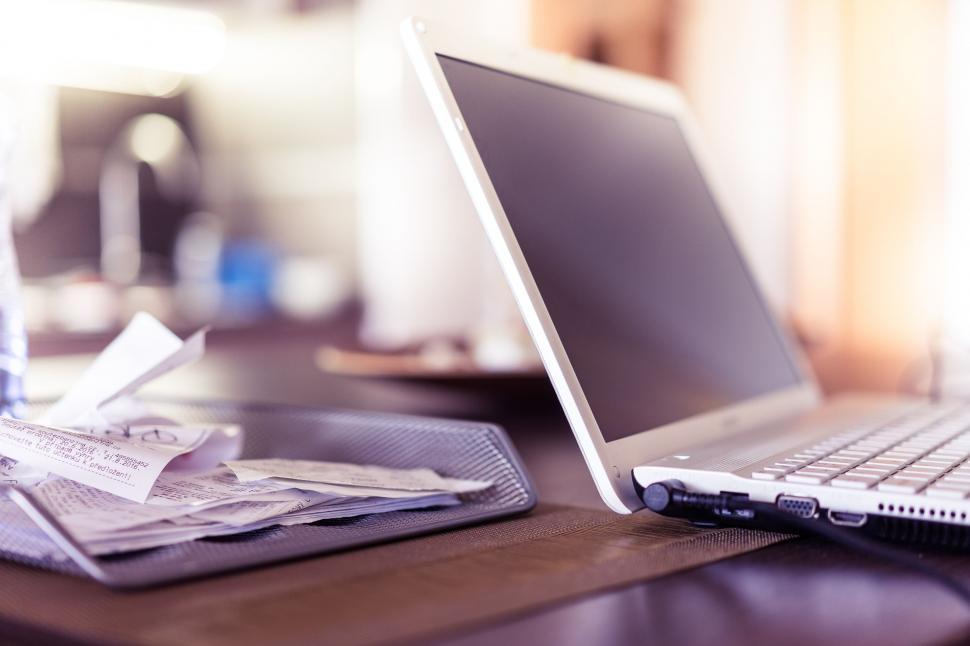 Free Image of Blur view of laptop on desk  