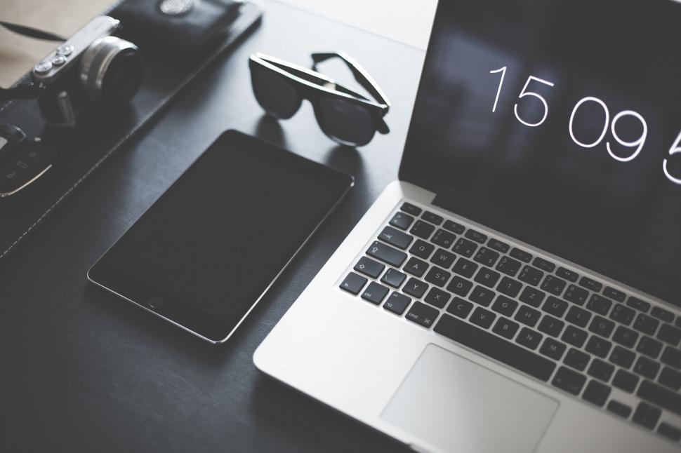 Free Image of Sunglasses and iPad 