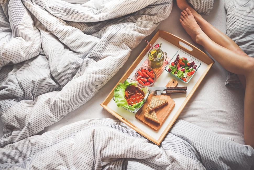 Free Image of Breakfast on bed with woman  