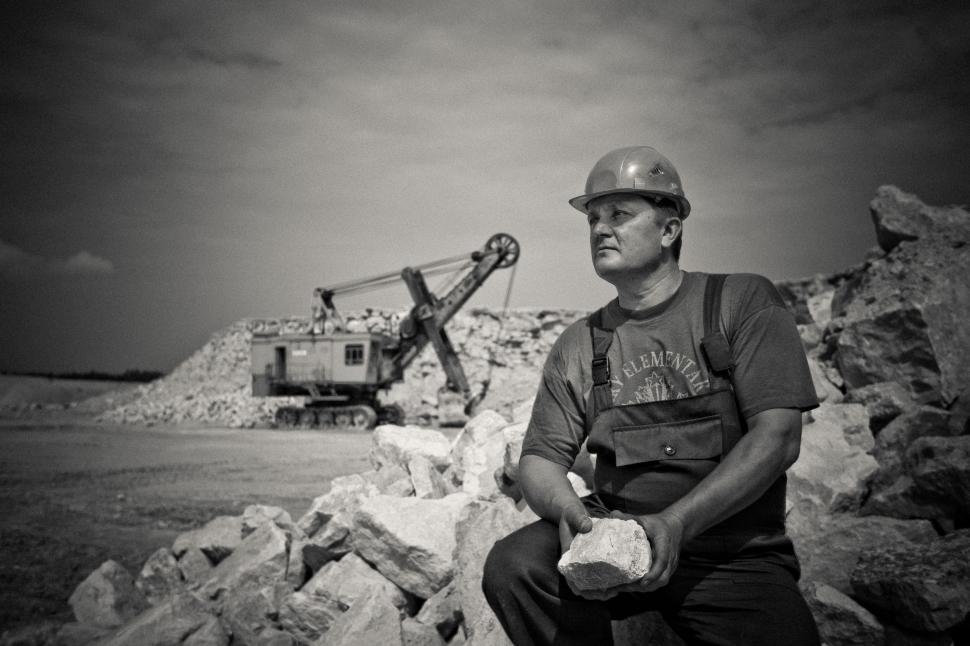 Free Image of Construction Worker with mine crane in the background 