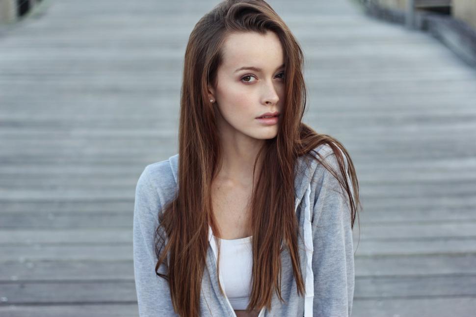 Free Image of Young Caucasian Woman with Open Hair - Eye contact 