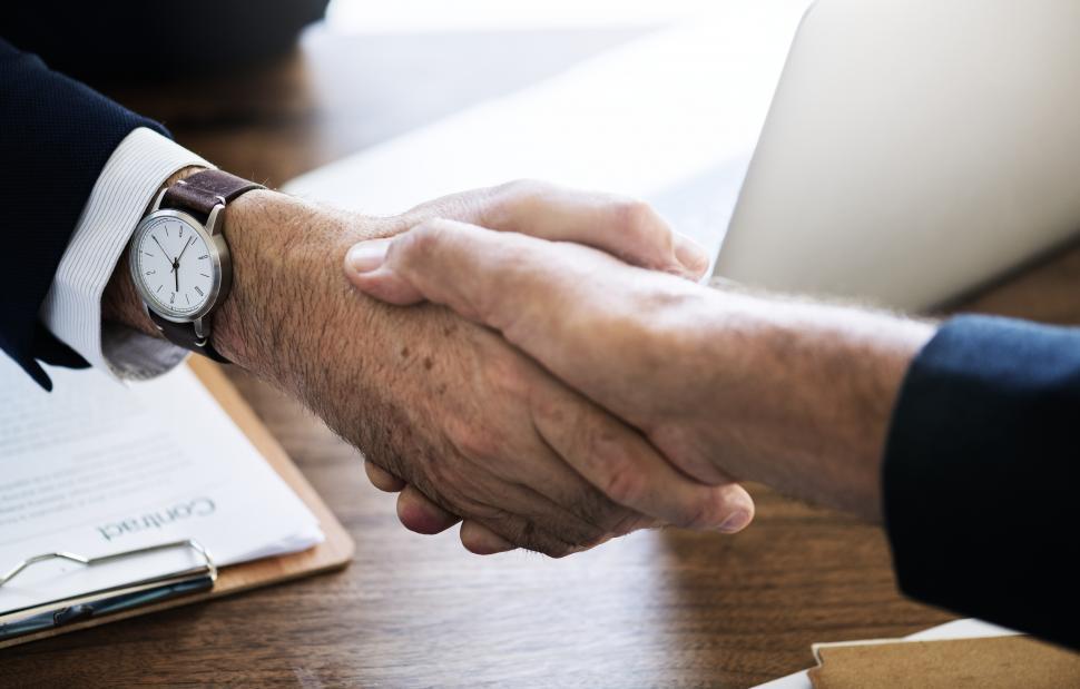 Free Image of Close up handshake between two people 