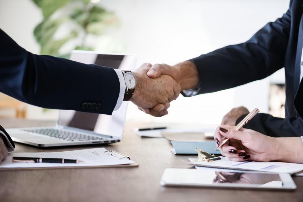 Free Image of Firm handshake between two business people 