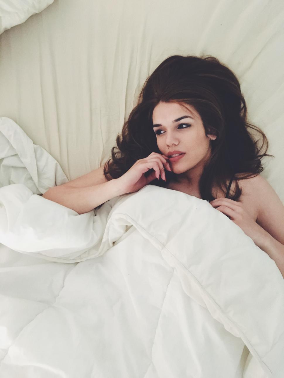 Free Image of Woman Under Blanket  