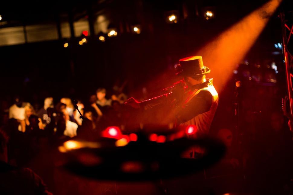Free Image of Musician With Mic on Stage 