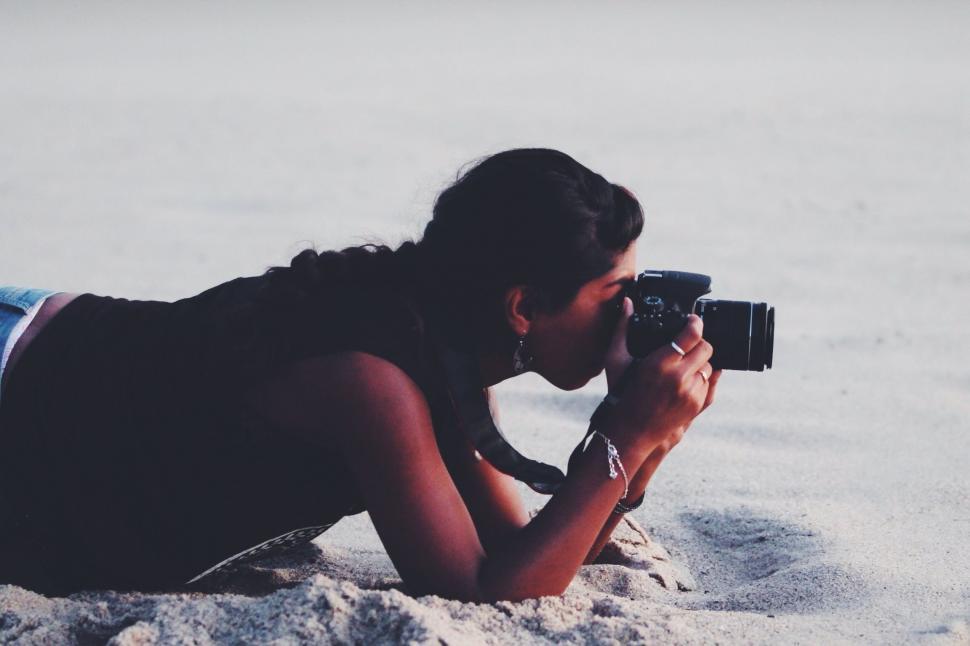 Free Image of Female Photographer with Camera  