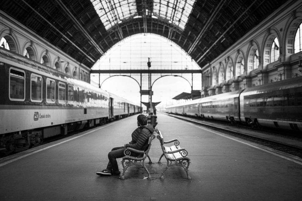 Free Image of Man on railway station bench - Monochrome  