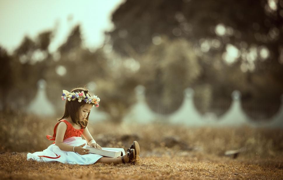 Free Image of Girl Child with Book  
