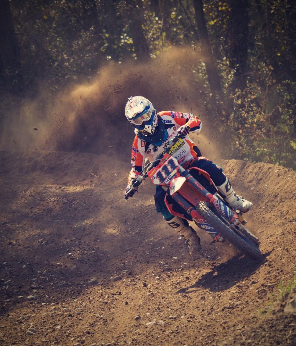 Free Image of Bike rider on dirt road  