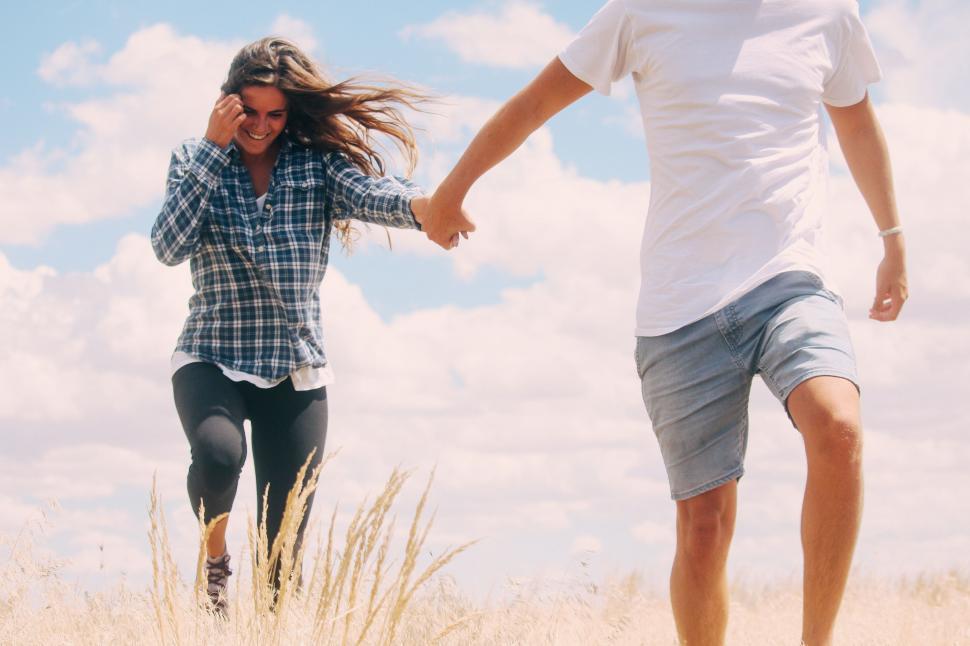 Free Image of Happy Couple Walking Together  