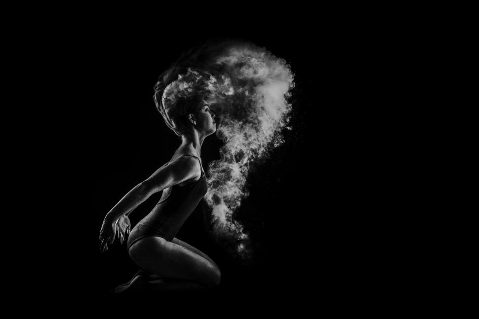 Free Image of Underwater Dark View of Woman in Swimming Pool  