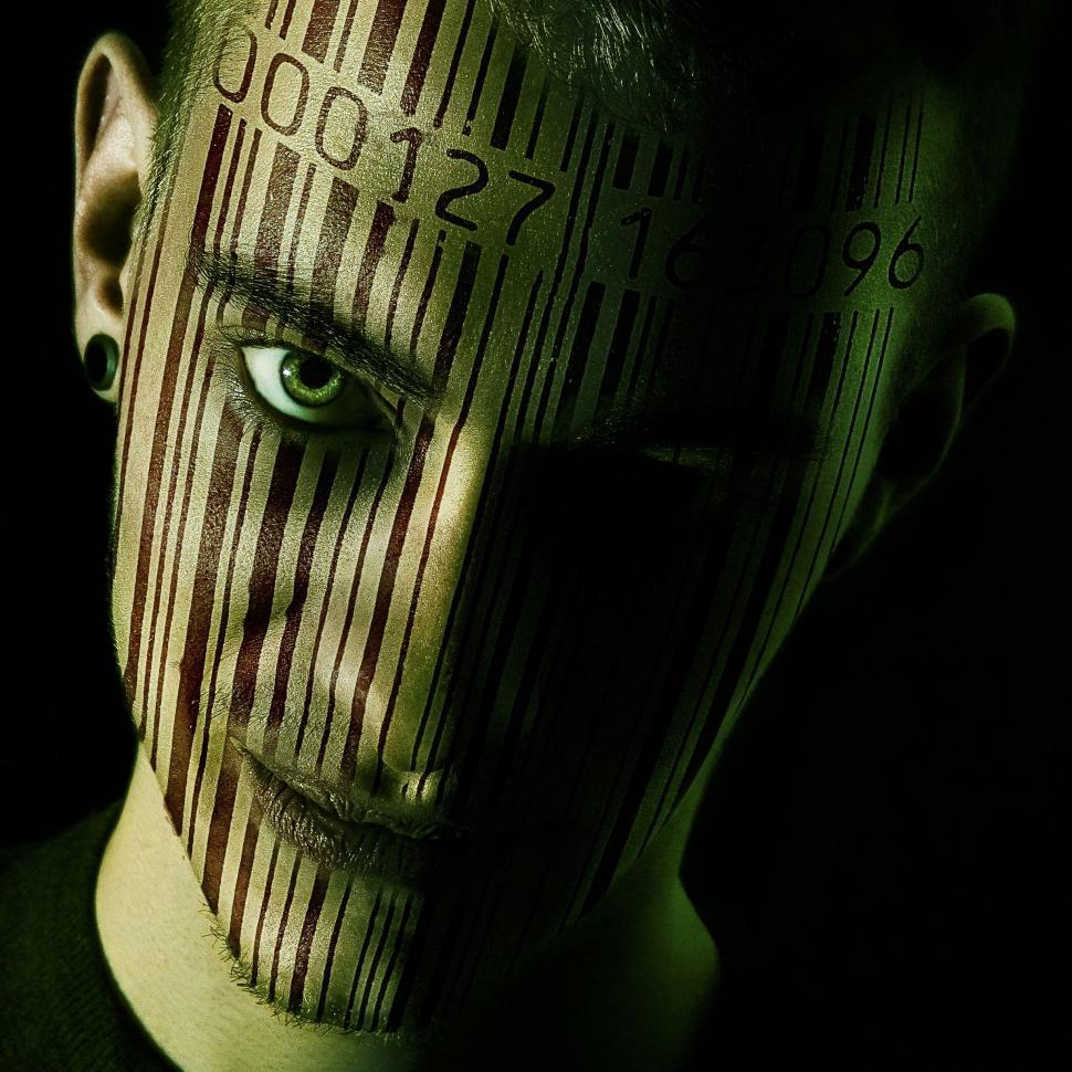Free Image of Man face with Barcodes 