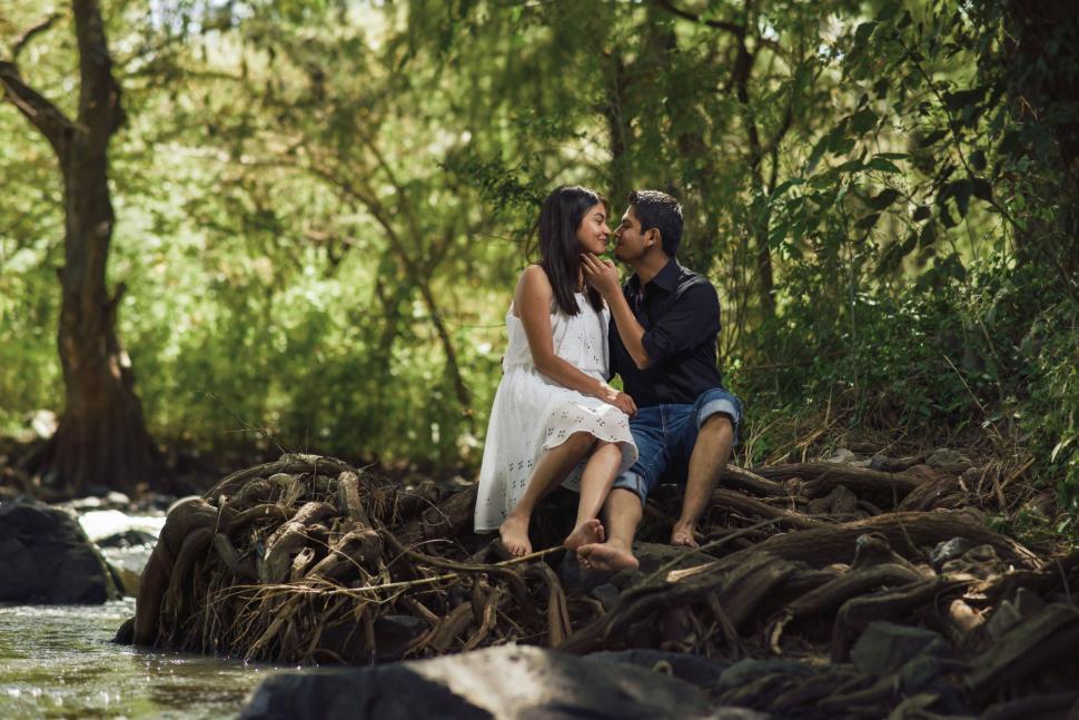 Free Image of Couple Romancing in the woods 