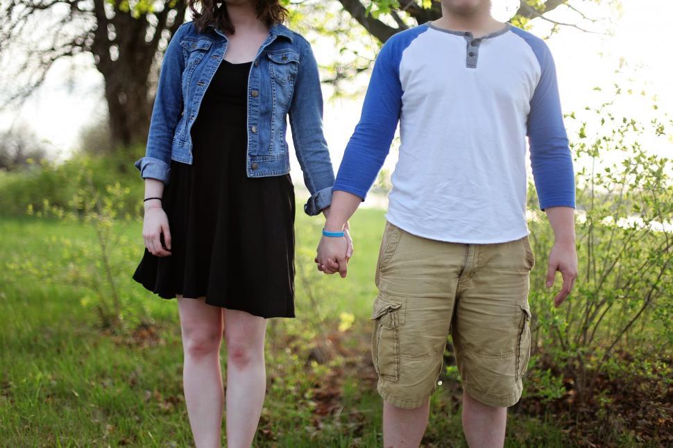 Free Image of Couple with holding hands  
