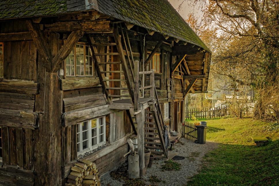 Free Image of Outside View of Cabin House with Stairs  