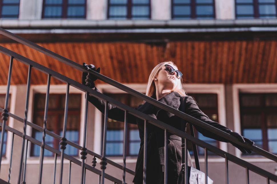 Free Image of Blonde Woman on Stairs  