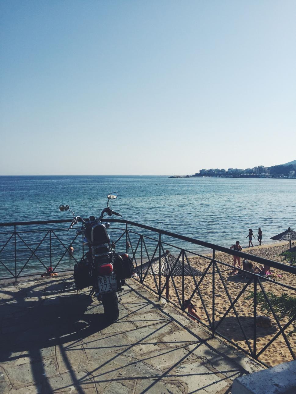 Free Image of Motorbike parked by the beach 