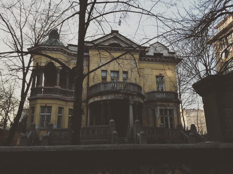 Free Image of Exterior View of old house with yellow walls  