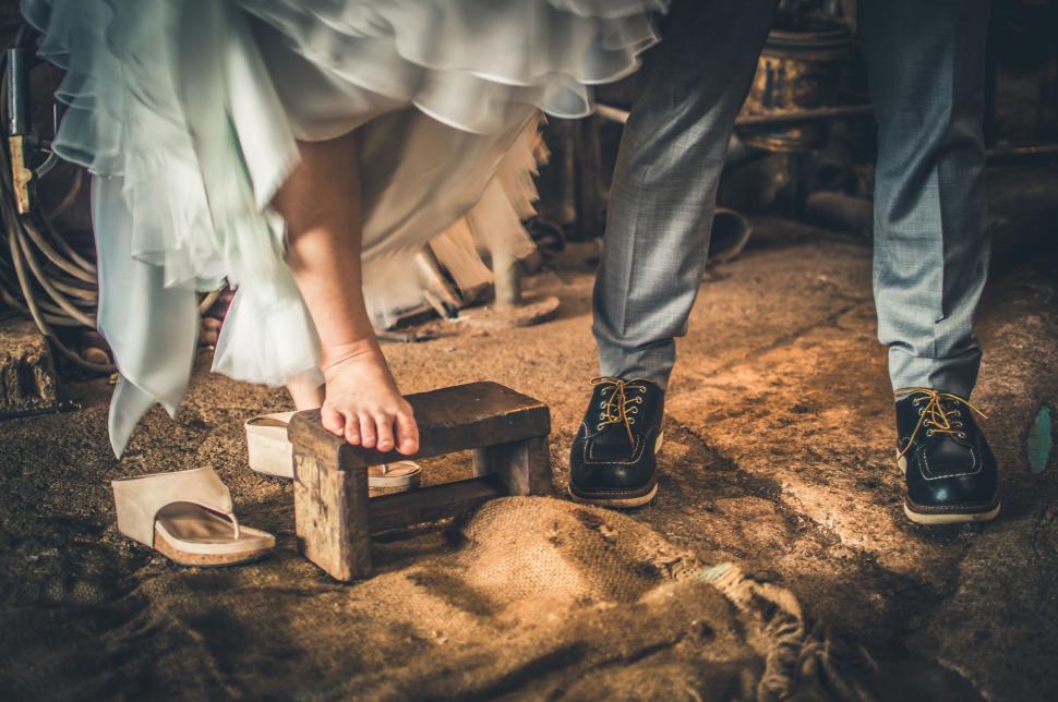 Free Image of Woman Foot on wooden stool  