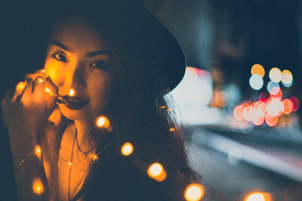 Free Image of Woman with light string 