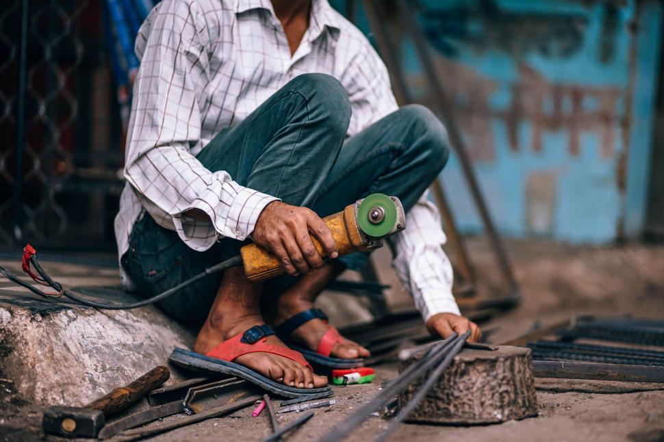 Free Image of Working With Angle Grinder 