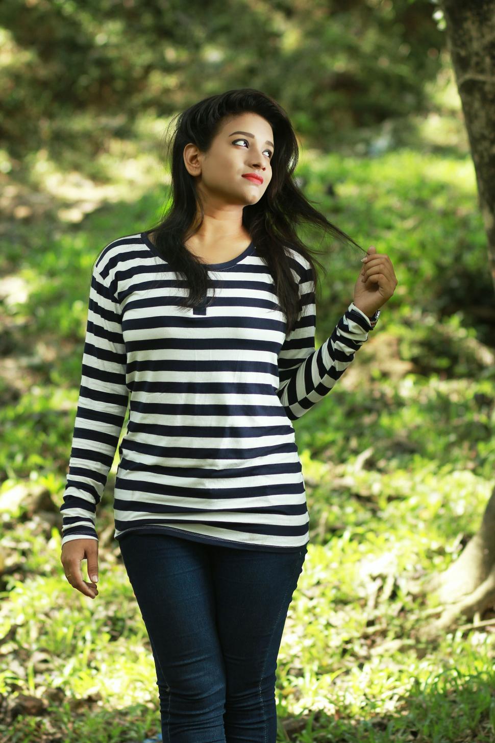 Free Image of Young Bangladeshi Woman with Green Grass  
