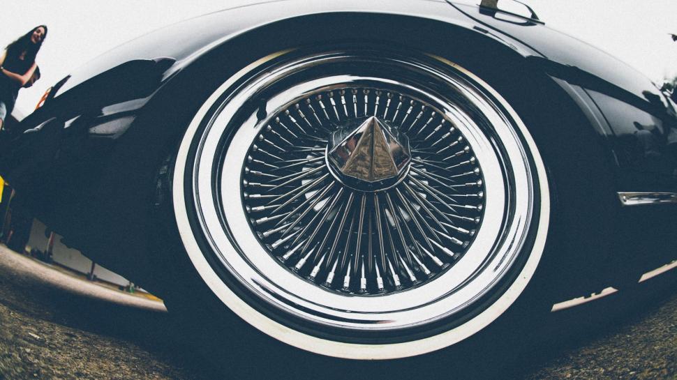 Free Image of Woman and Car Wheel  