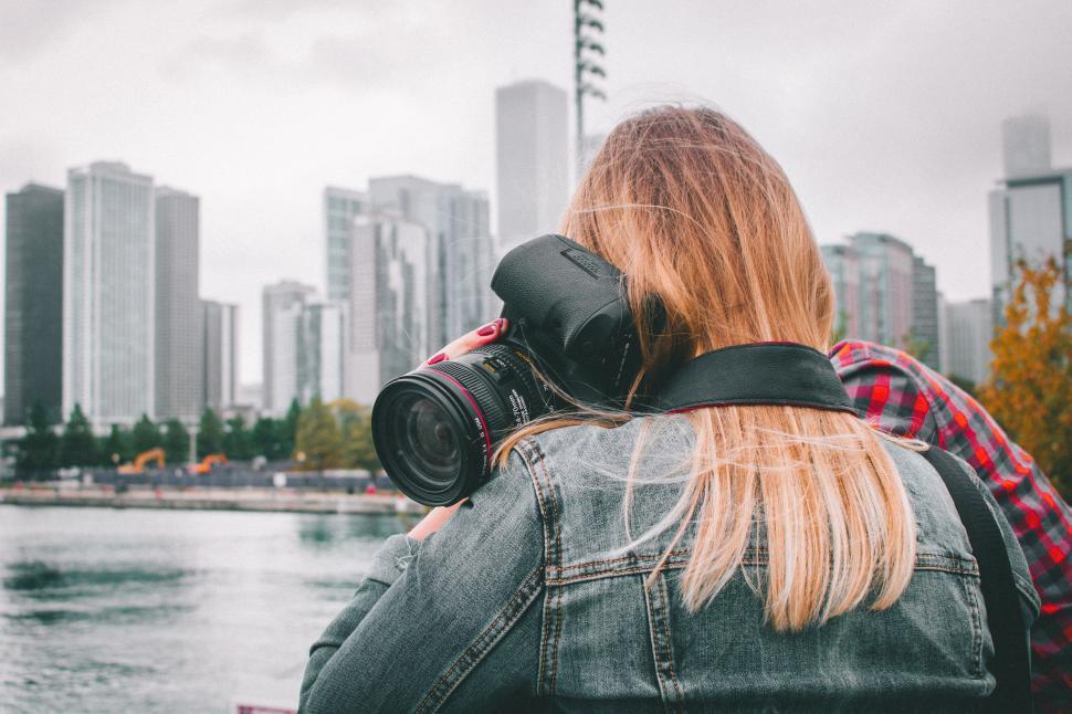 Free Image of Blonde Woman with Camera 