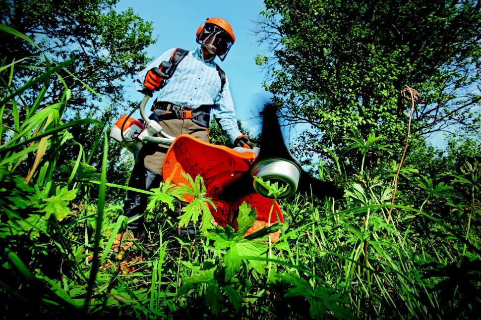 Free Image of Man with grass cutter 