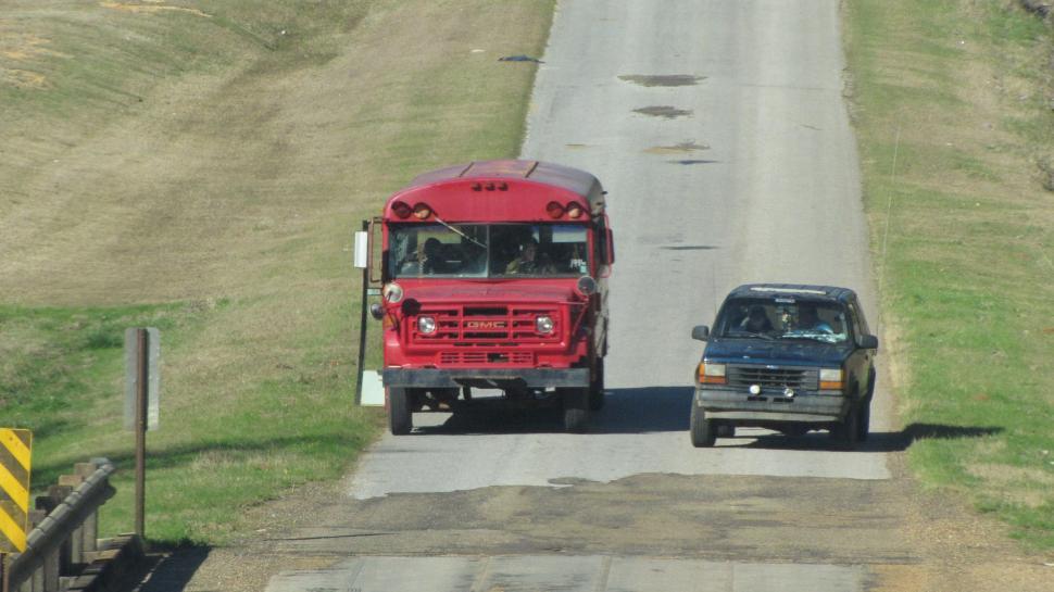 Free Image of Red Bus and SUV Car  