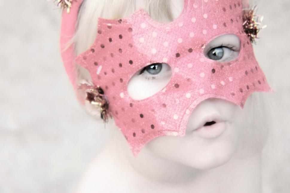 Free Image of Little Girl in Masquerade Mask 