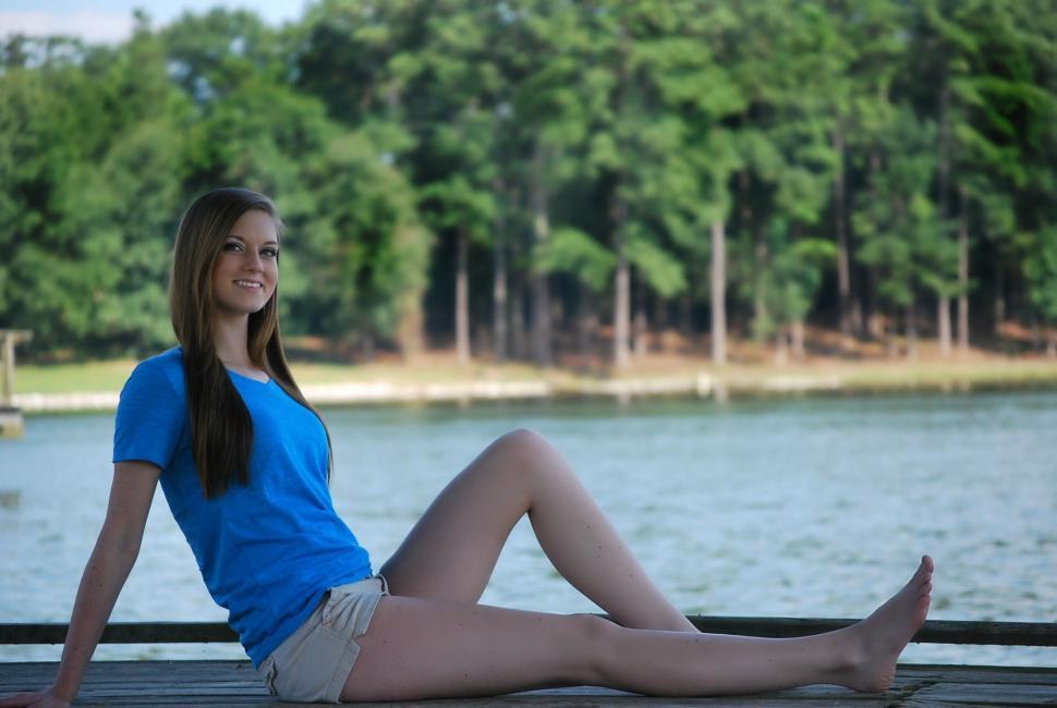 Free Image of Woman Posing on Dock - Looking at camera  