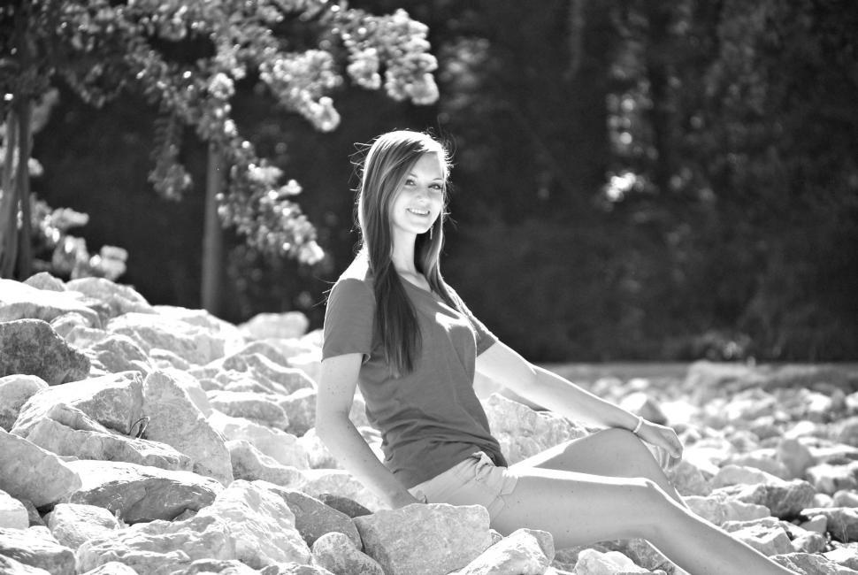Free Image of Woman Posing on Rocks - Looking at camera  