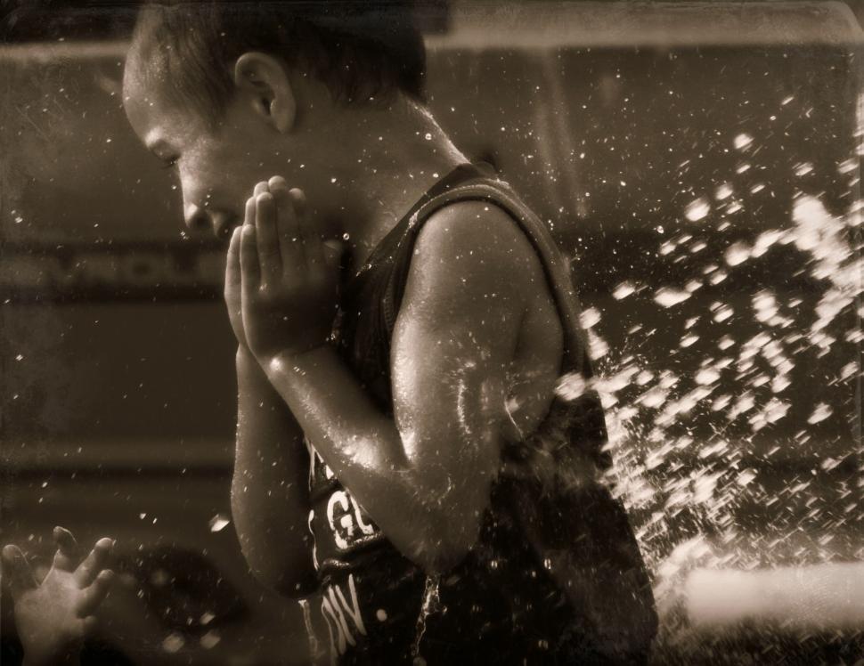 Free Image of Little Child Splashing Water 