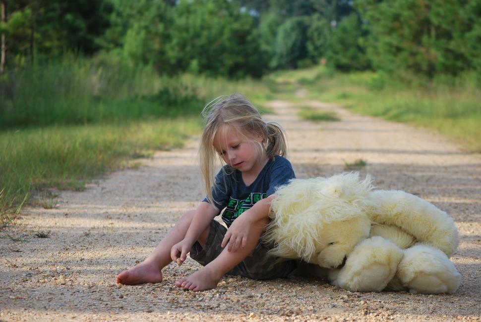 Free Image of Little Girl With Teddy Bear  