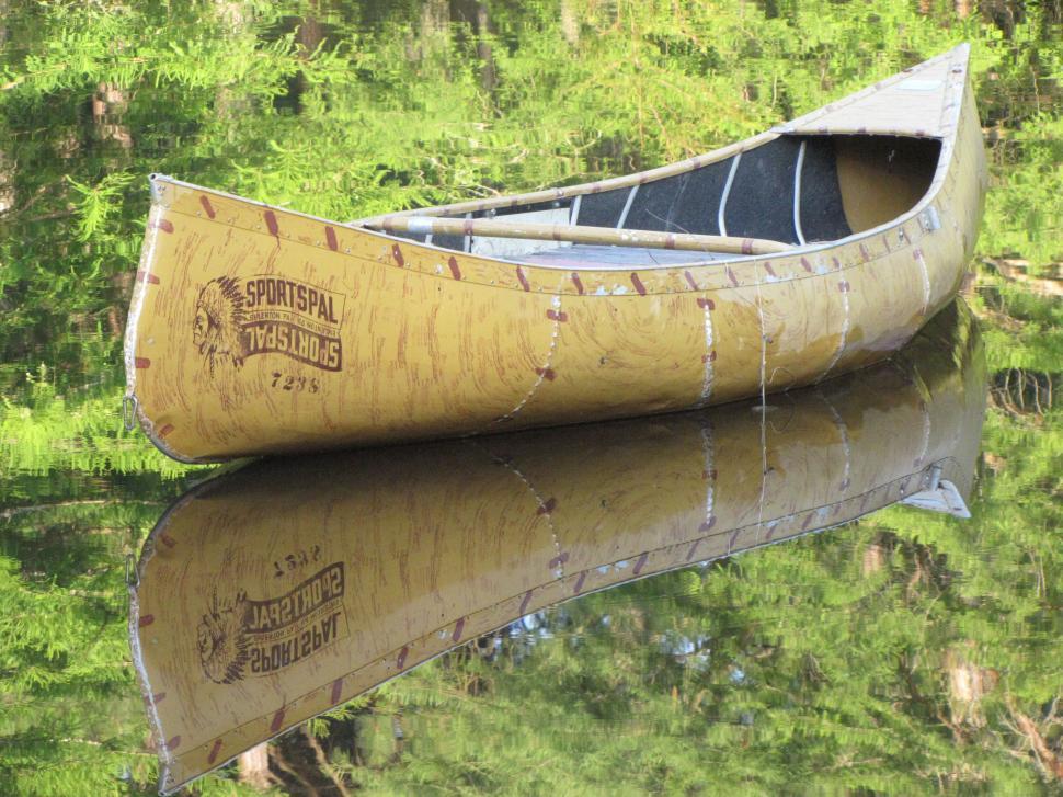 Free Image of Sportspal canoe and green plants  
