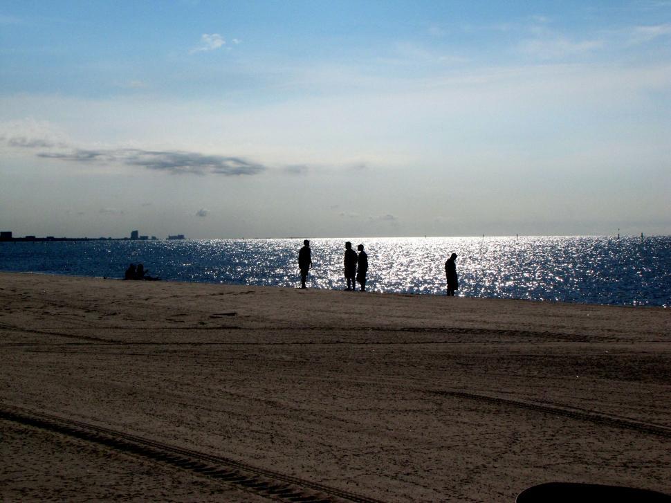 Free Image of People at beach with blue sky  